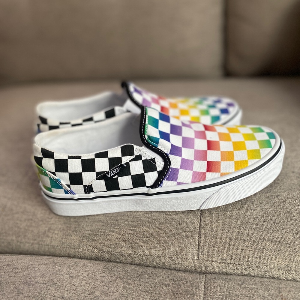 New woman’s rainbow slip on vans